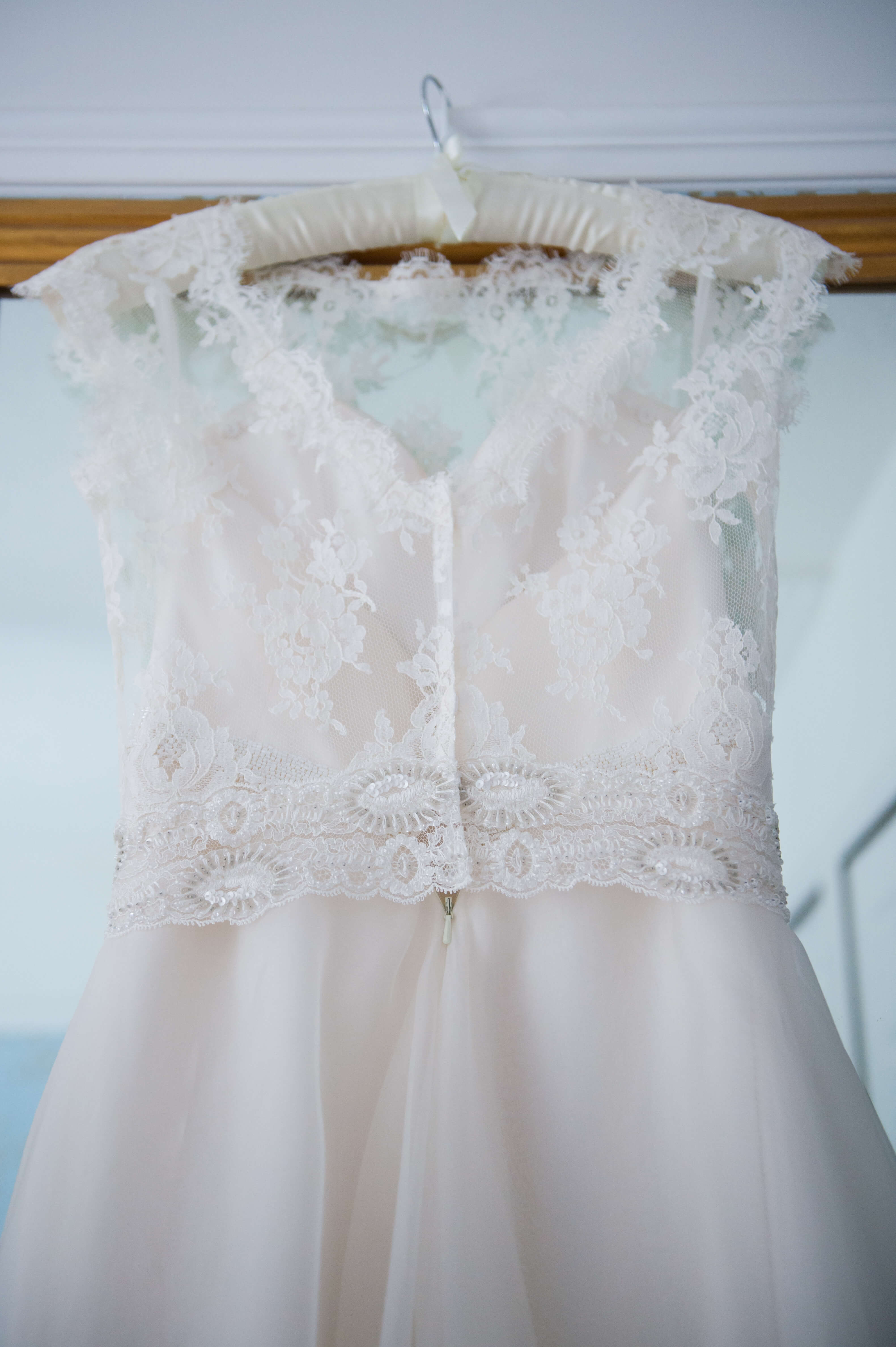 A white wedding dress by Emma Hunt London and Gillian Million
